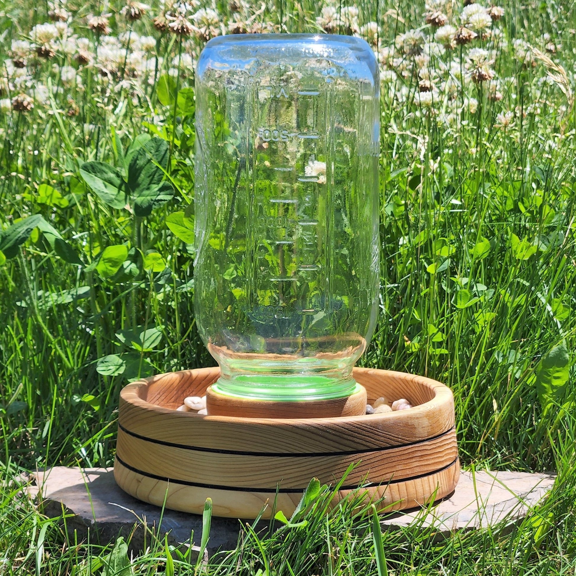 https://masonandmonarch.com/cdn/shop/products/bee-watering-station-248166.jpg?v=1685132374&width=1946